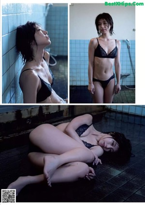 A woman in a blue bra and white panties posing for a picture.