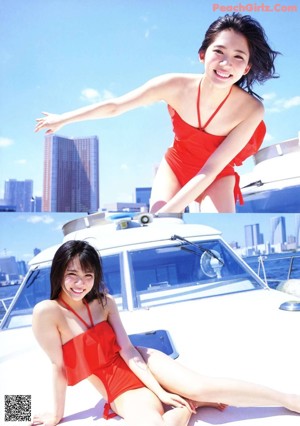 A woman in a red bikini posing on a boat.