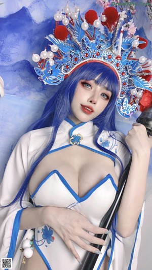 A woman with blue hair wearing a blue and white costume.